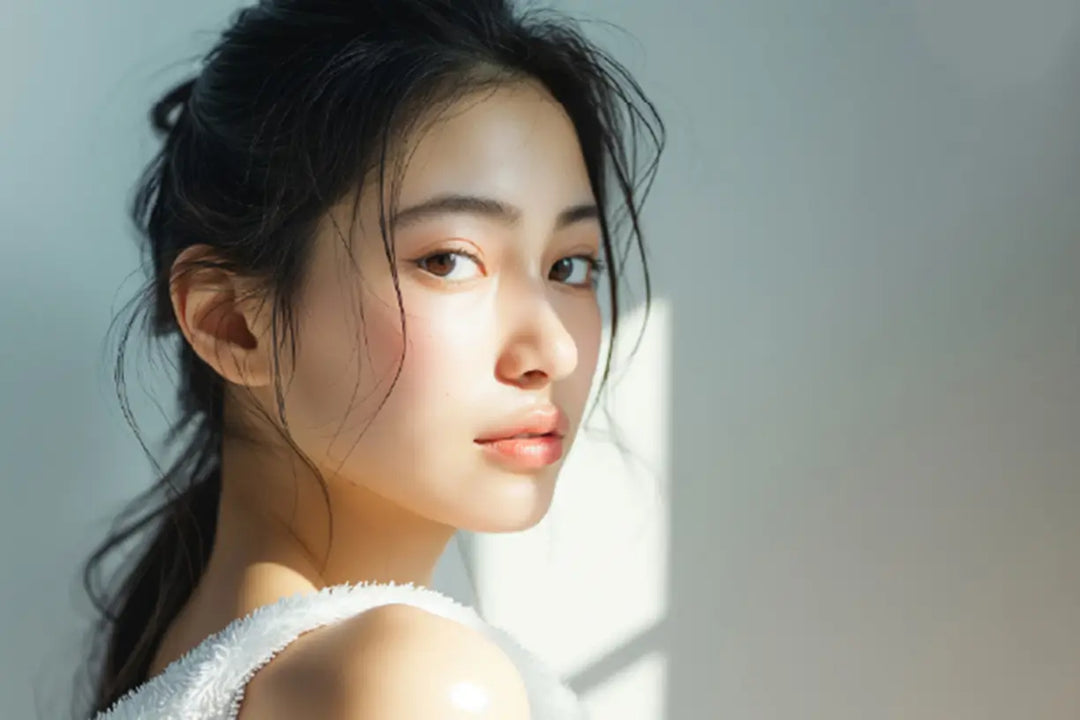 A Young Asian Woman with Sun Shining on Her Face